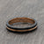 black and gold wedding ring