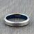 silver and blue wedding ring